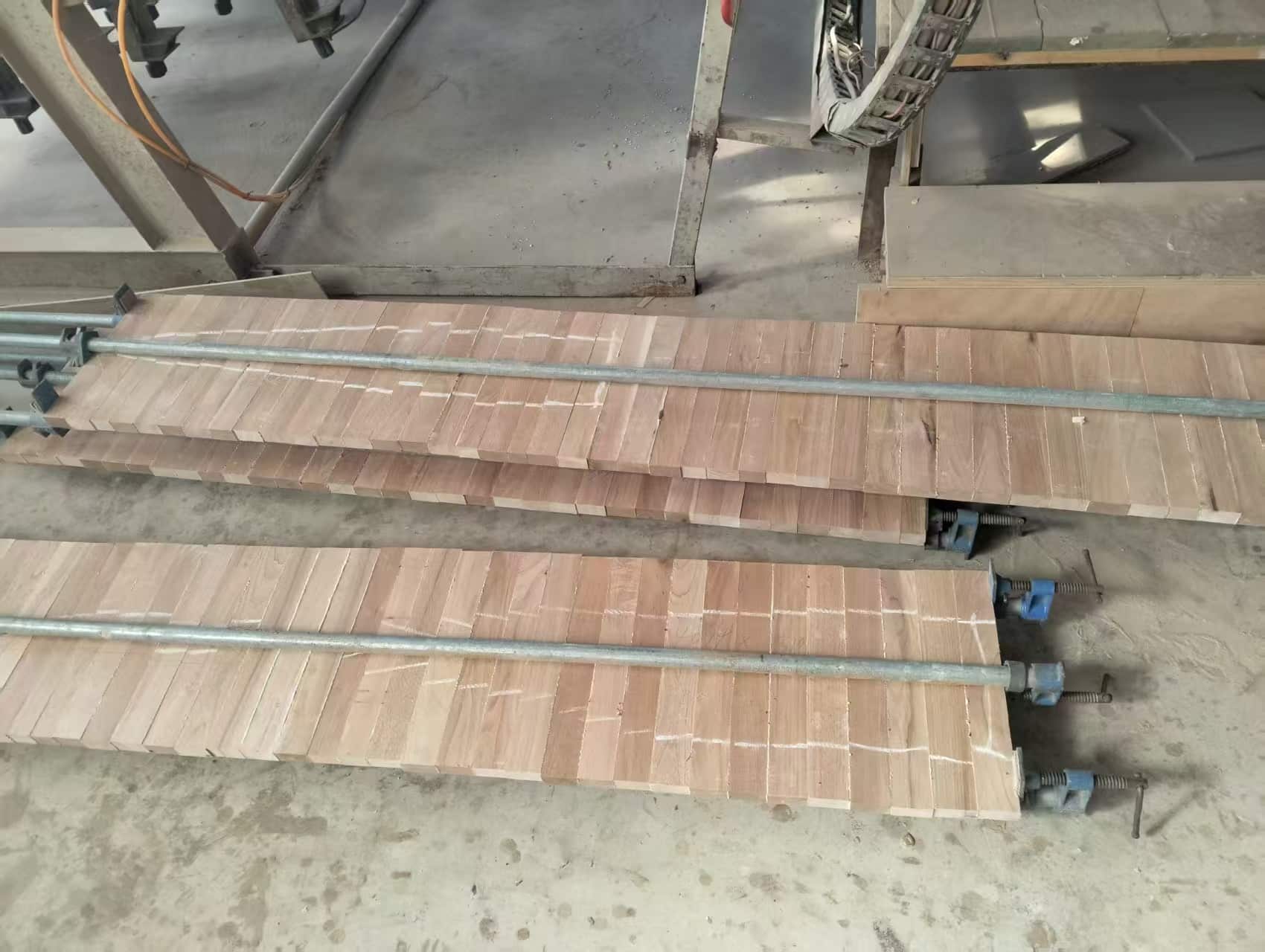 European solid oak boards used for custom solid oak vanity construction, showing rustic grade wood texture and thickness