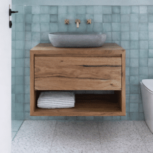 Solid oak single sink bathroom vanity with quartz countertop and porcelain sink