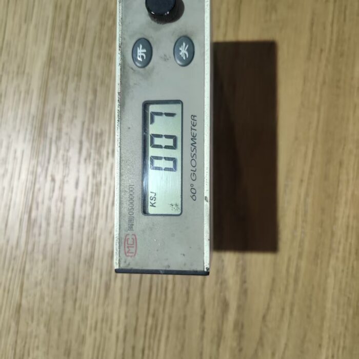 60-degree gloss meter test on oak wood flooring surface