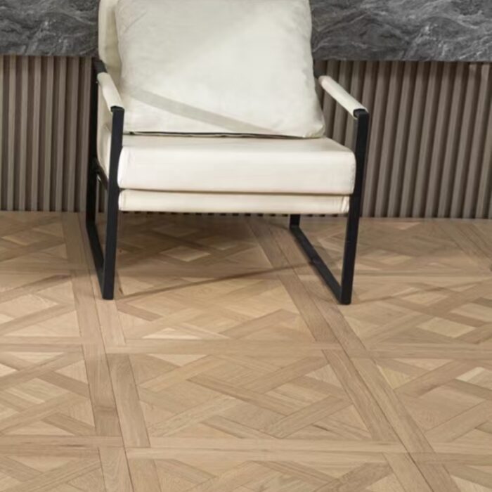 Solid oak Versailles flooring installed in interior space, showing geometric parquet panel layout and natural wood grain