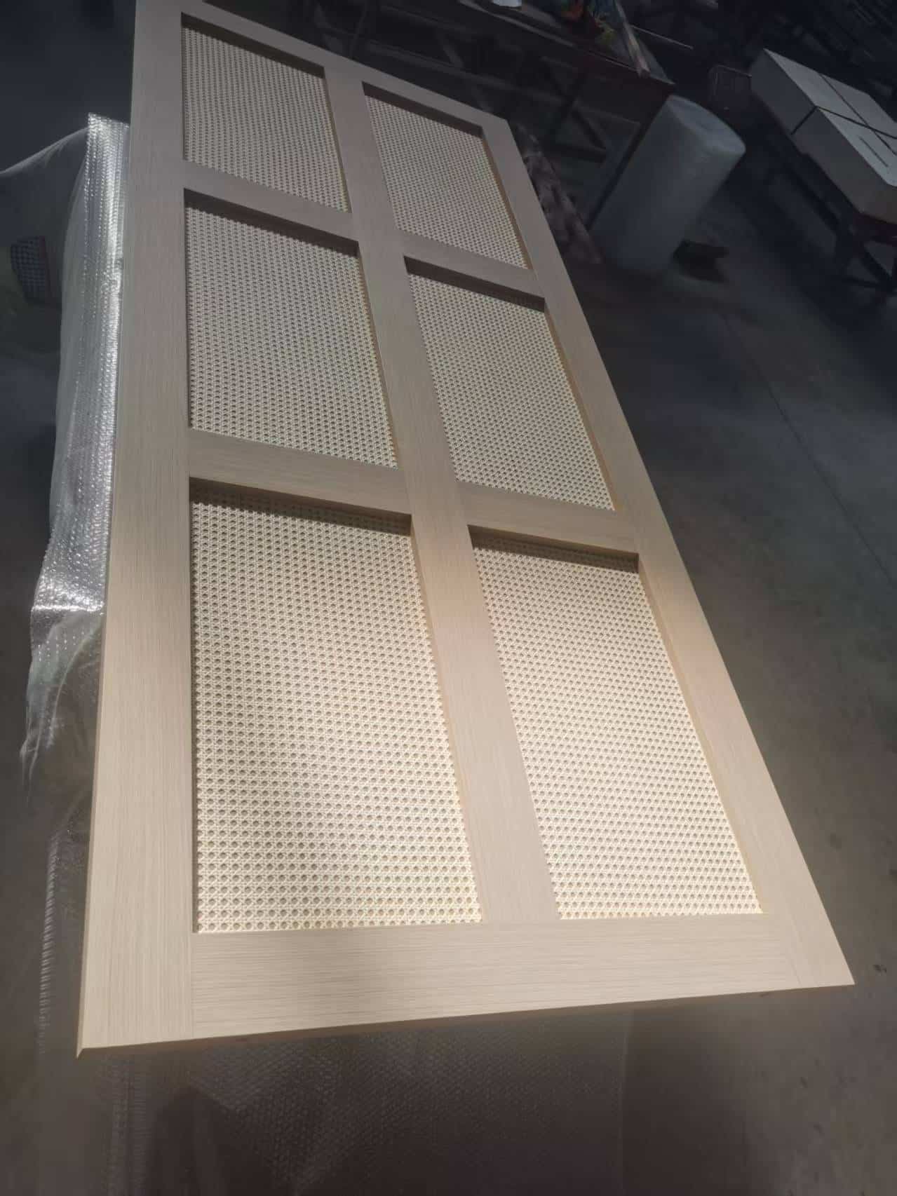 oak timber rattan panel door flat layout before installation