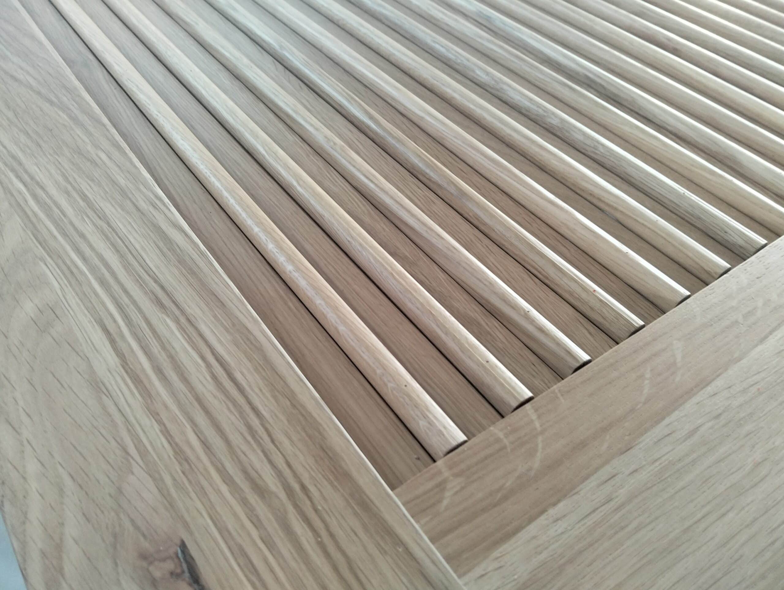 reeded wood panel craftsmanship detail for oak interior door
