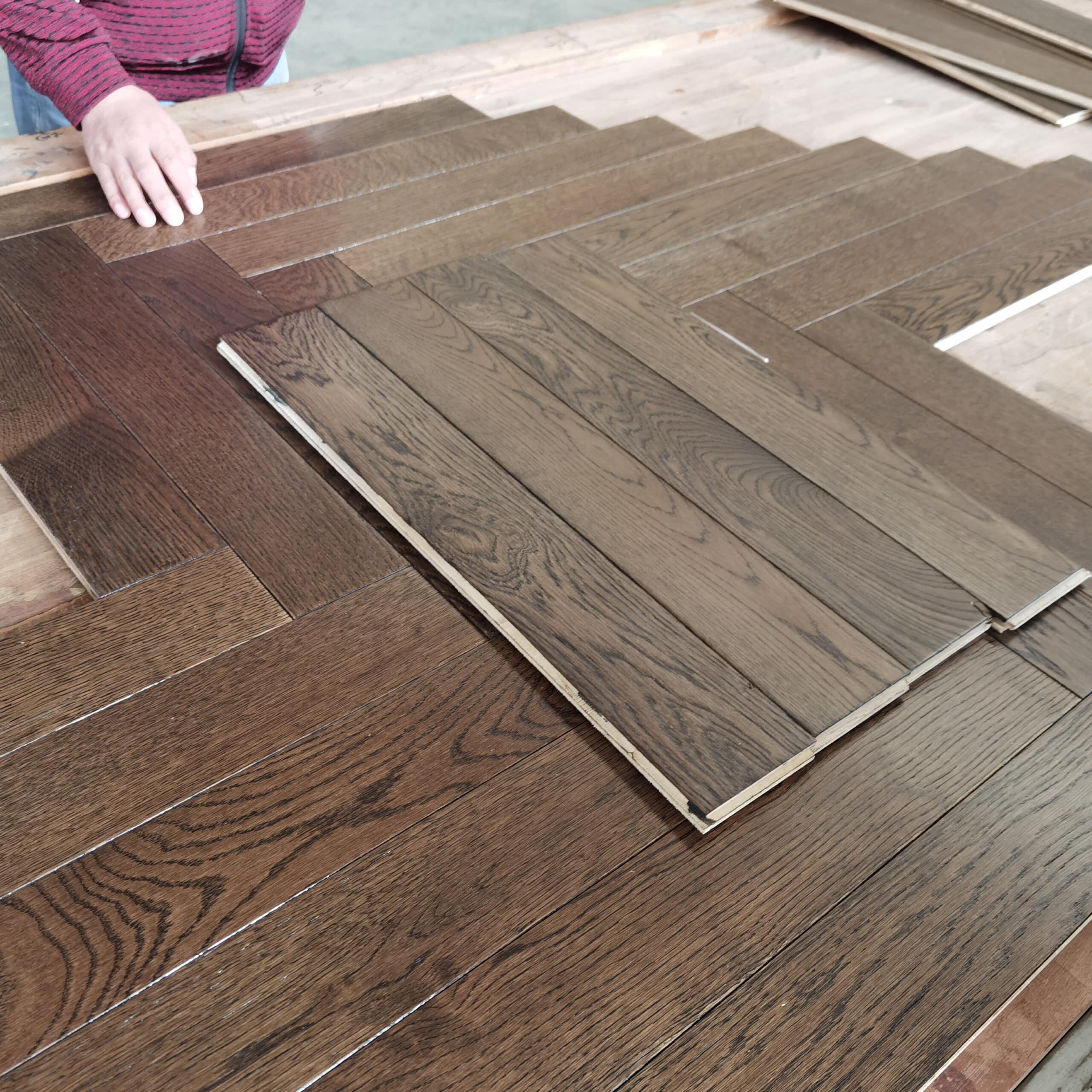 black wash oak herringbone flooring installation pattern