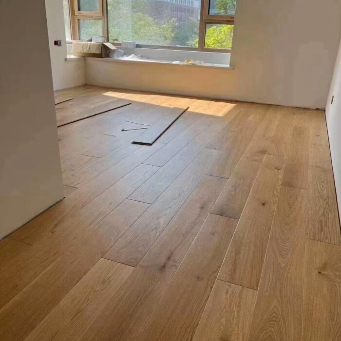 engineered oak plank flooring installation in residential renovation project