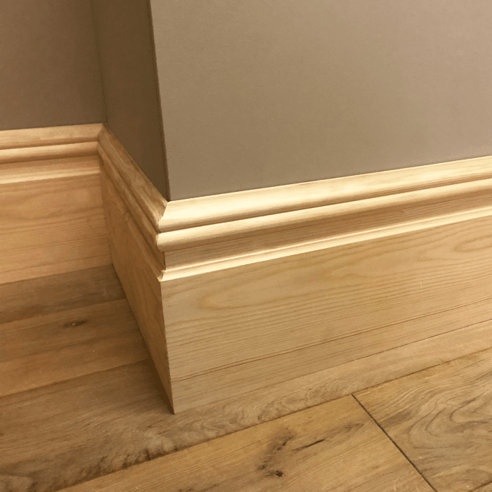 skirting boards installed with wood flooring interior detail