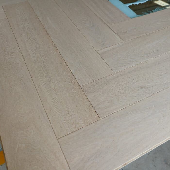 oak herringbone wood flooring surface finish matte lacquer parquet floor detail