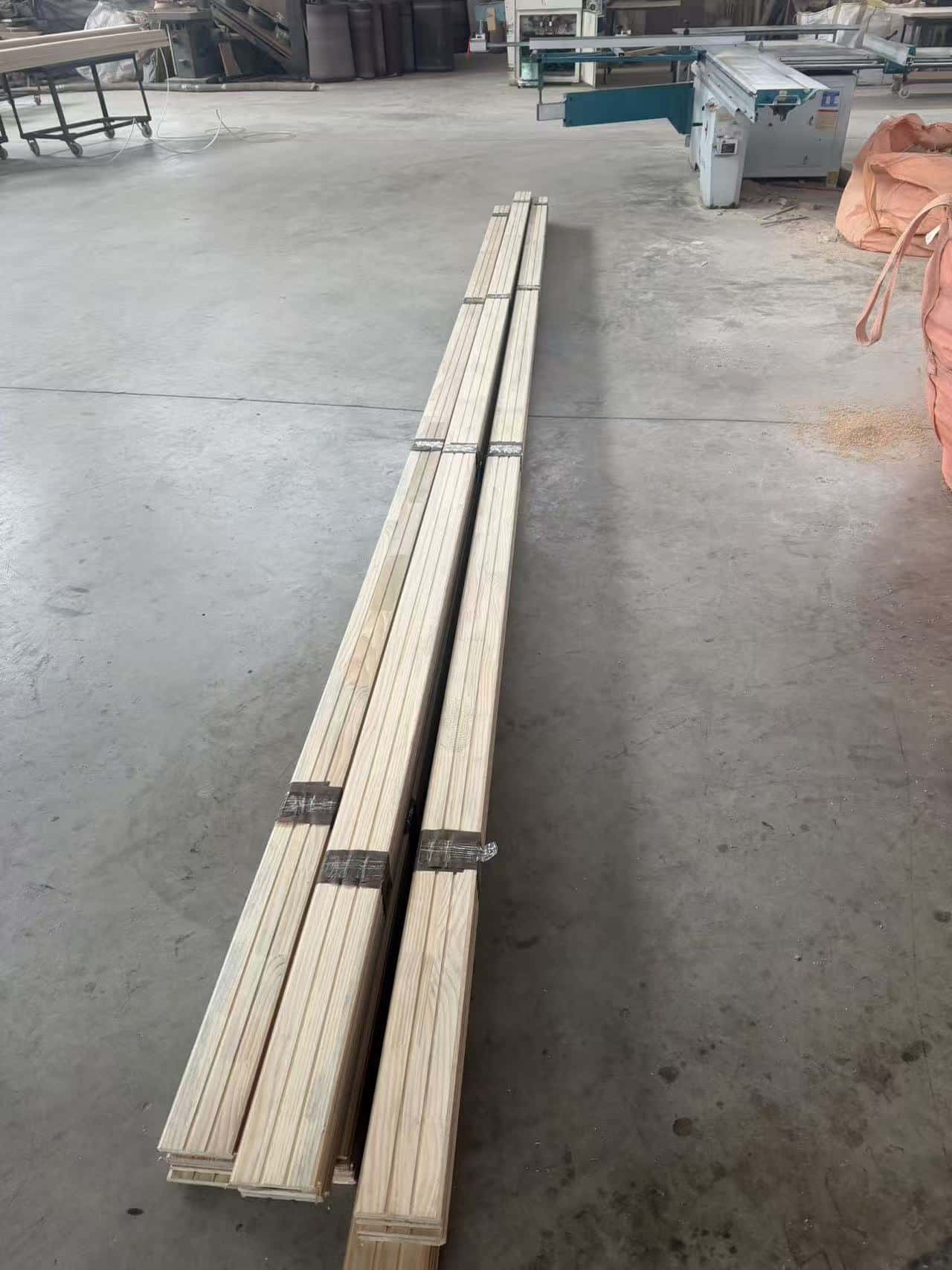 wooden baseboard matching wood flooring interior