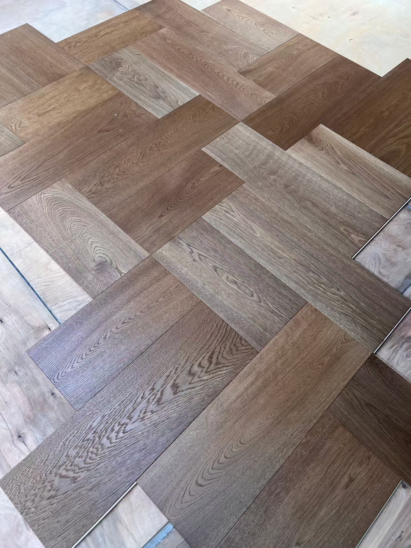 cross herringbone engineered flooring closeup texture
