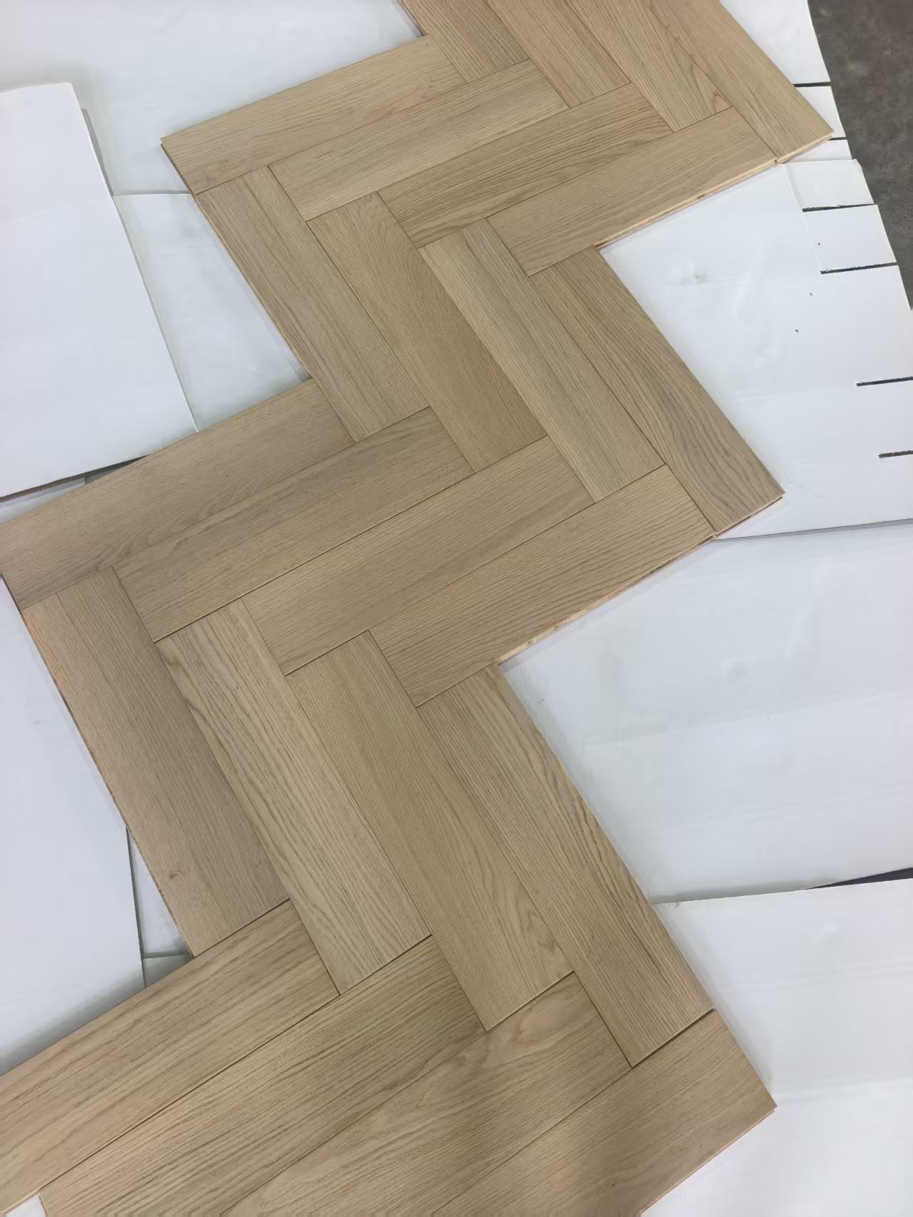 brushed UV lacquered oak herringbone flooring surface