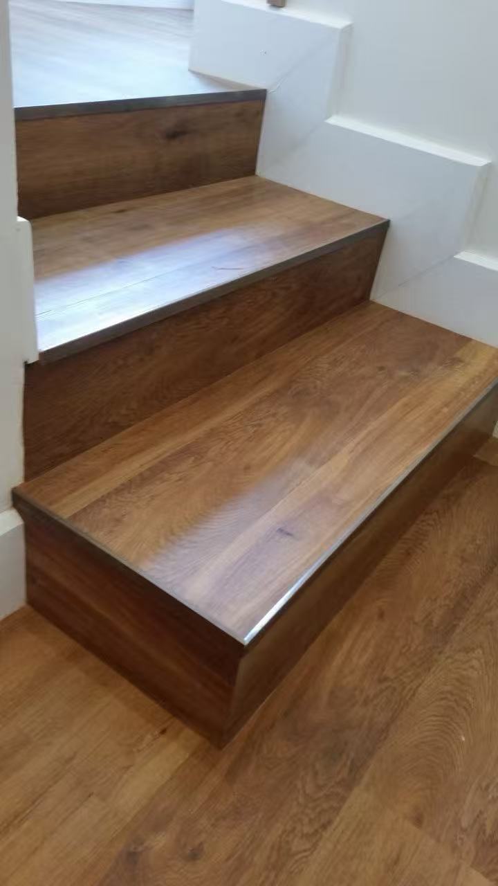 custom stair treads coordinated with timber flooring