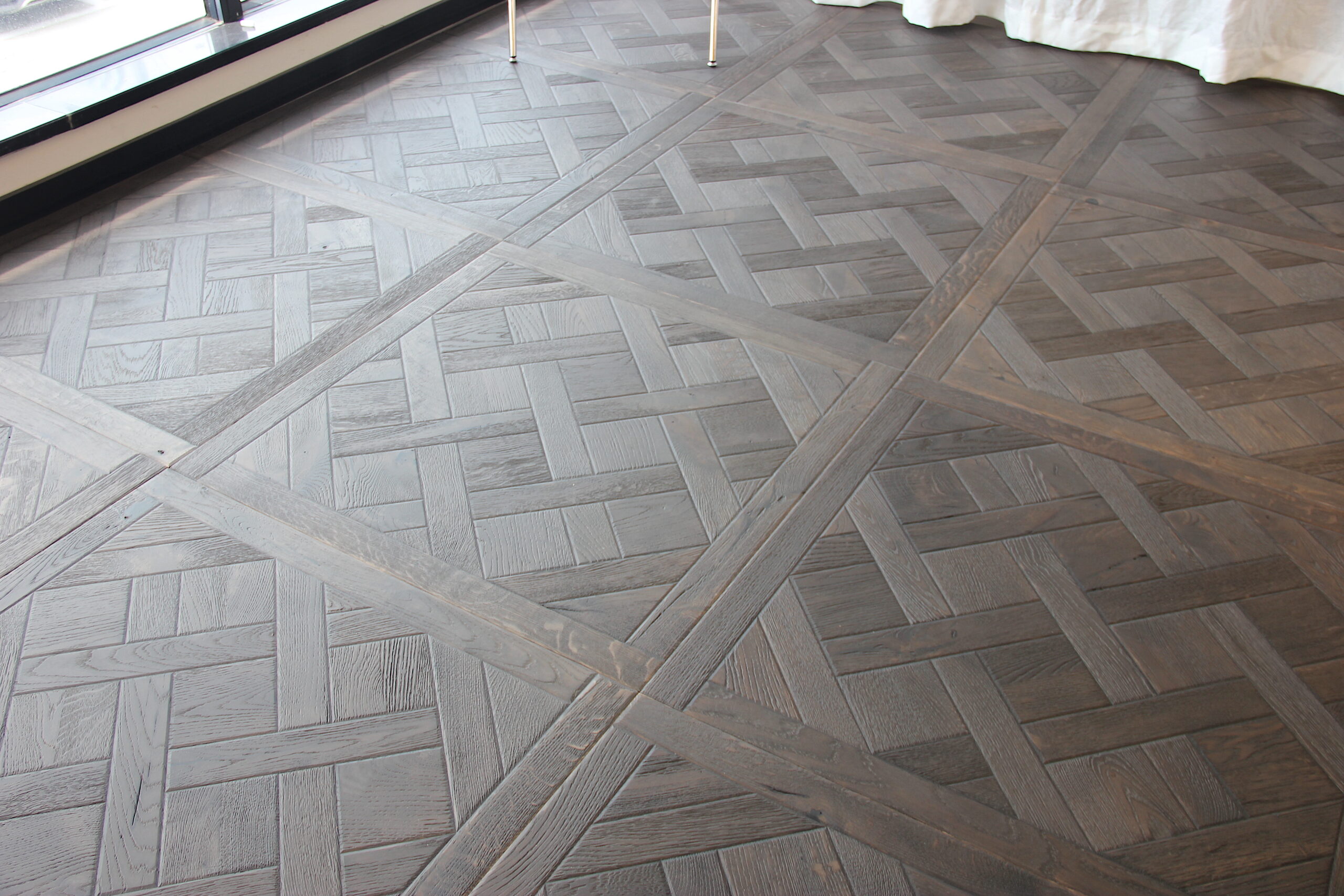 reactive stained antique oak Versailles flooring pattern