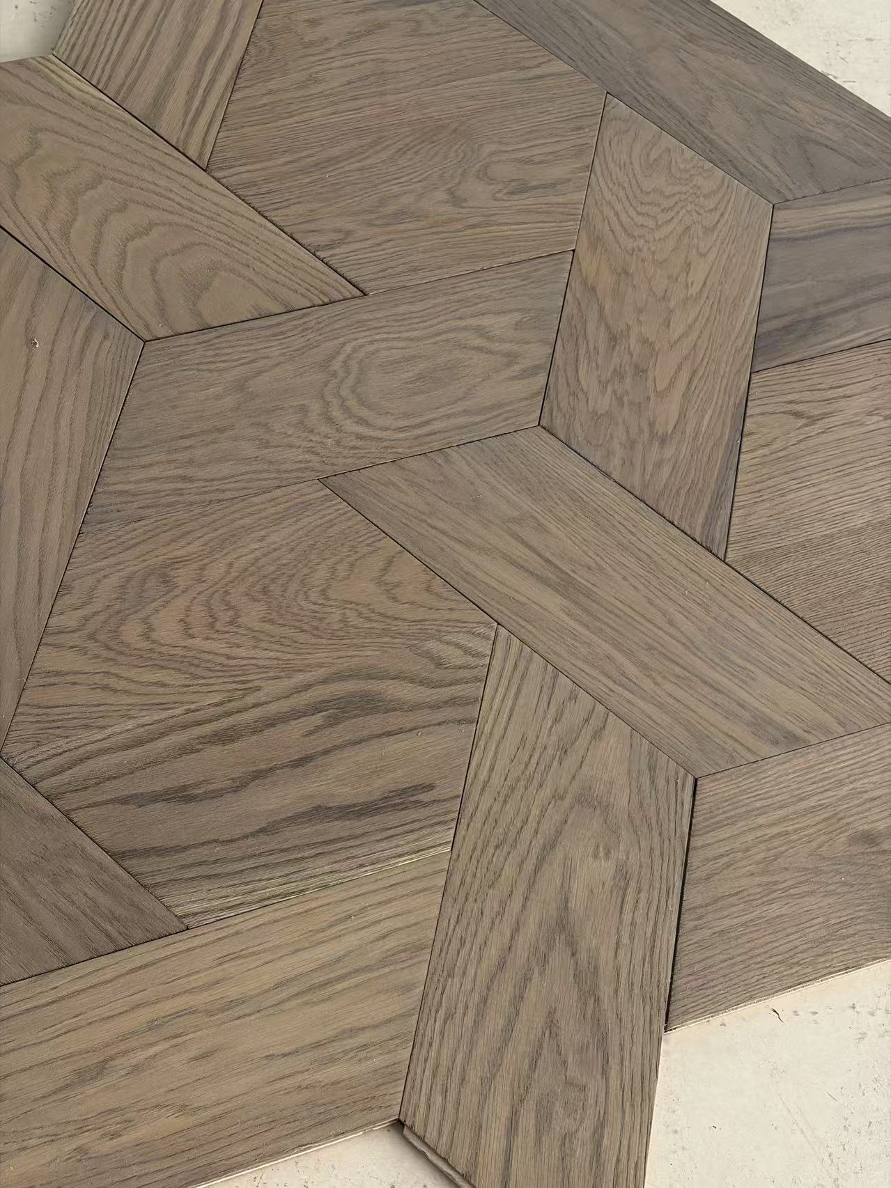 stained braid pattern oak flooring close up